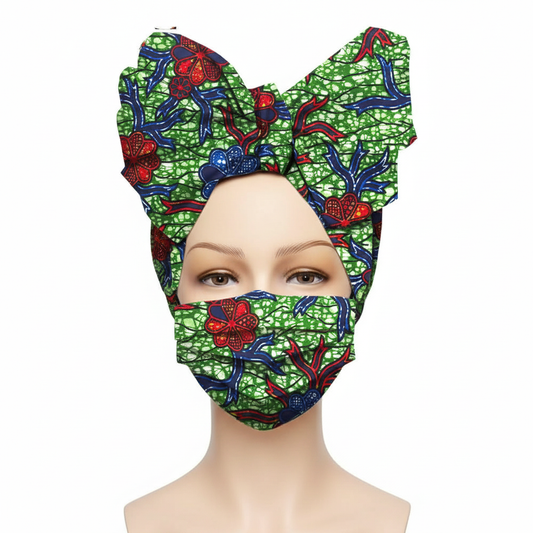 Mannequin head wearing a green floral headscarf and matching face mask on a white background
